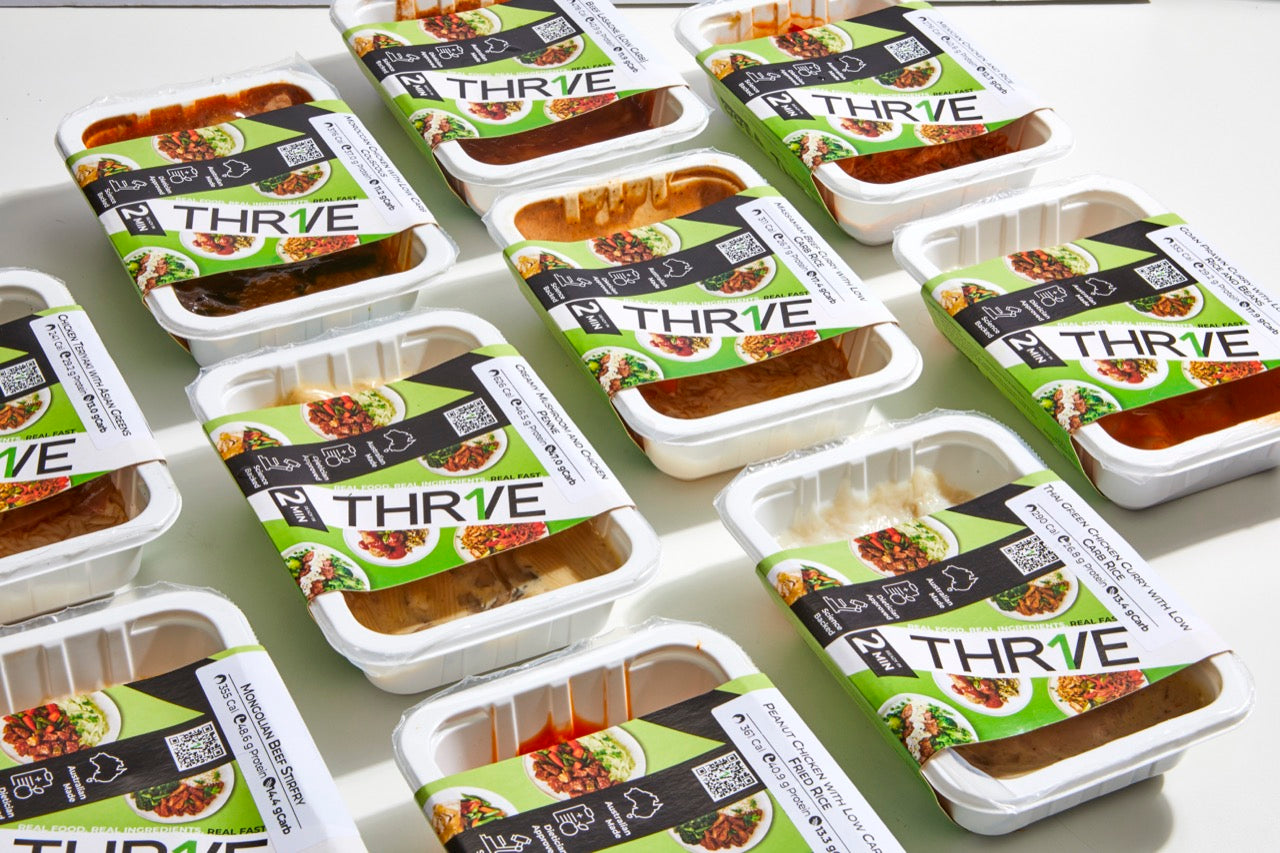THR1VE meals produced at scale, labelled and ready to ship